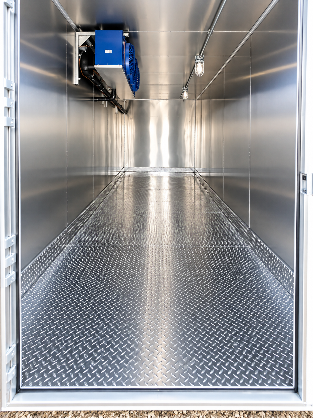 Owner-supplied 12 ft refrigerated-trailer interior with stainless steel walls and cooling equipment